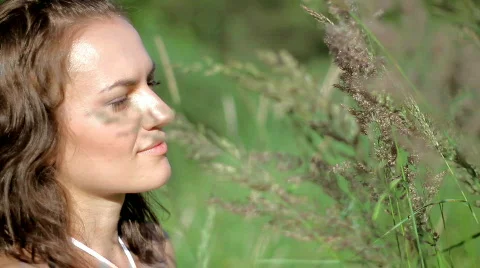 Woman in grassfields Stock Footage 785902