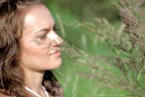 Woman in grassfields  Stock Footage 785915