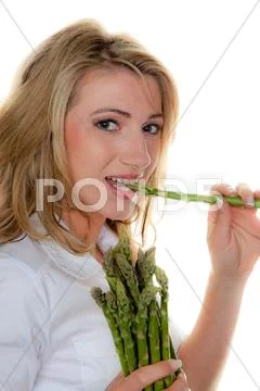 Woman with green asparagus Stock Photos