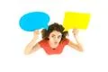 The woman grimace near the dialog signs. View from above Photo