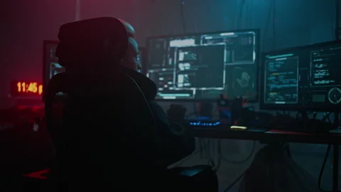 Woman hacker examines coding intricacies of system program Stock Footage 257807321