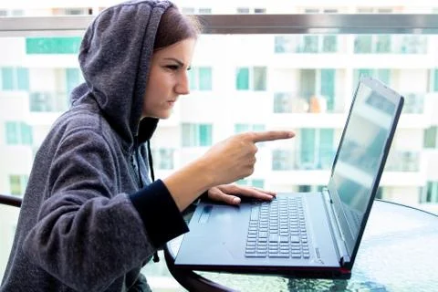 Woman Hacker programmer is working on computer in cyber security center filled Stock Photos