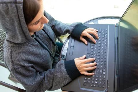 Woman Hacker programmer is working on computer in cyber security center filled Stock-Fotos