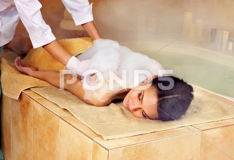 Woman in hammam or turkish bath Stock Photos