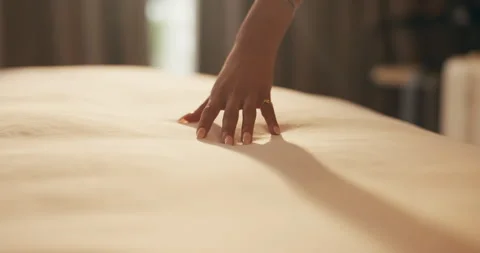 Woman, hand and touch sheets on bed for material quality, fabric texture and Stock Footage 335265448