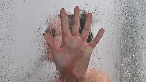 Woman hand during the shower, conceptual wash away negativity Stock Footage 256167053