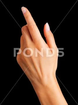Woman hand with the index finger pointing up Stock Photos
