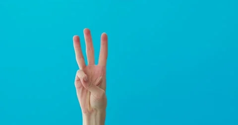 Woman hand making a countdown isolated Stock Footage 150353712