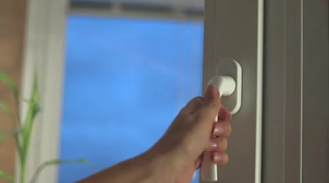 Woman hand opens window  Stock Footage 65969883