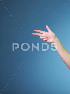 Woman hand pointing direction with finger Stock Photos