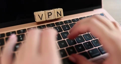 Woman hand presses button on computer keyboard text VPN closeup Stock Footage 221407049