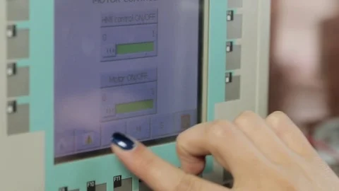 Woman hand presses the button device Stock Footage 75307160