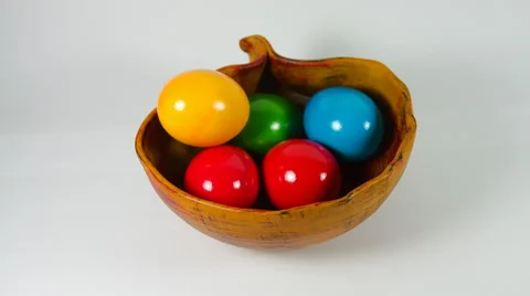 Woman Hand Putting Colored Easter Eggs In A Bowl Stock Footage 60070211