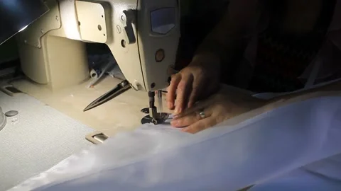 Woman Hand on Sewer Stitch White Cloth u, Stock Video
