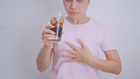 Woman hand stop and refuse gesture to carbonated soft drink, feeling Abdomi.. Stock Footage 343482489