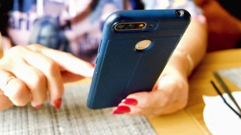 Woman hand typing mobile message on screen smartphone. Close up female hands Stock Footage 118755755