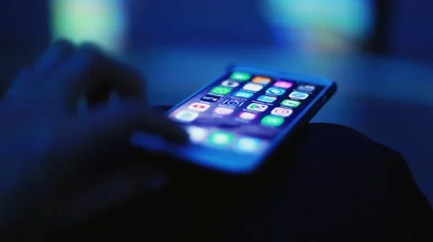 A woman hand use a mobile phone to select a application. 1920x1080 Stock Footage