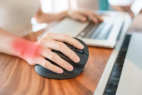 Woman hand using computer ergonomic mouse, prevention wrist pain because wo.. Stock Photos