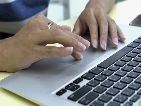 Woman hand using laptop Stock Footage 74817657