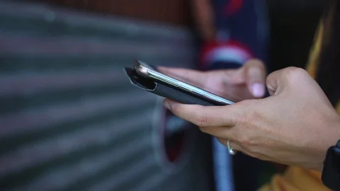 Woman hand using a smartphone Stock Footage 95819201