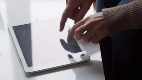 Woman hand using tablet computer Stock Footage 71194188