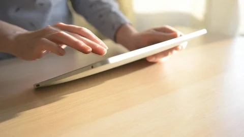 Woman hand using tablet computer pc commuter Video stock 73724109