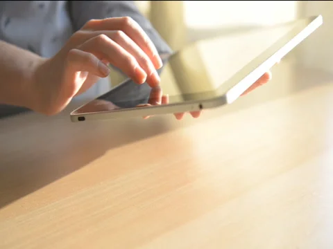 Woman hand using tablet computer pc commuter Video stock 73724150