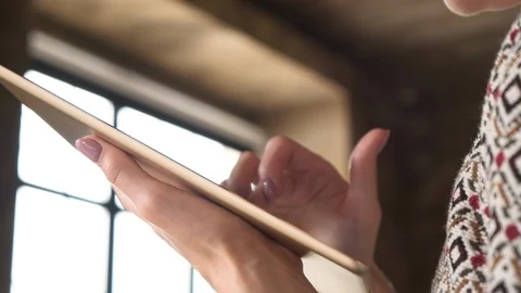 Woman hand using touchscreen display of interactive floor standing tablet Stock Footage 120024405