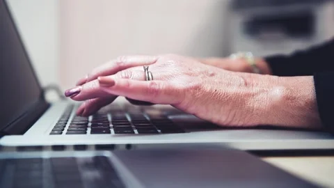 Woman hand working on a notebook using touchpad and keyboard, close up. Slo.. Stock Footage 328116244