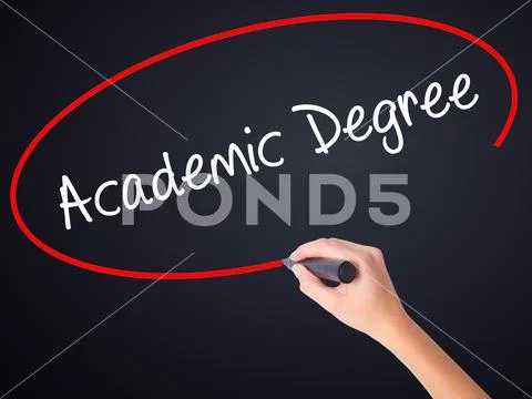 Woman Hand Writing Academic Degree with a marker over transparen Stock Photos
