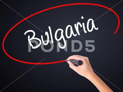 Woman Hand Writing Bulgaria with a marker over transparent board Stock Photos
