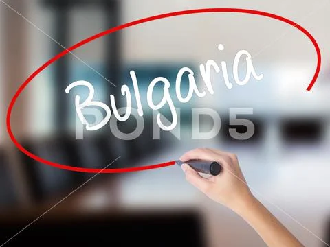 Woman Hand Writing Bulgaria with a marker over transparent board Stock Photos
