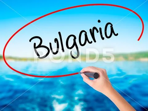 Woman Hand Writing Bulgaria with a marker over transparent board Stock Photos