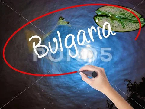 Woman Hand Writing Bulgaria with marker over transparent board Stock Photos