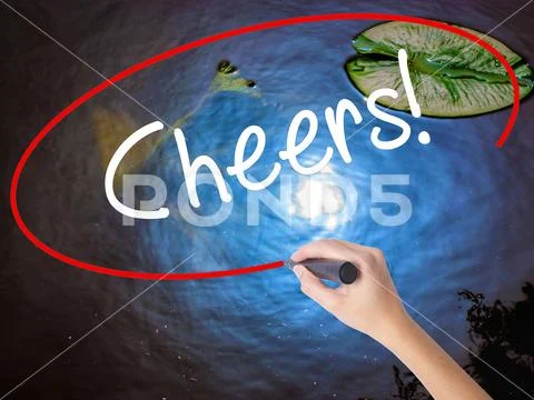 Woman Hand Writing Cheers! with marker over transparent board Stock Photos