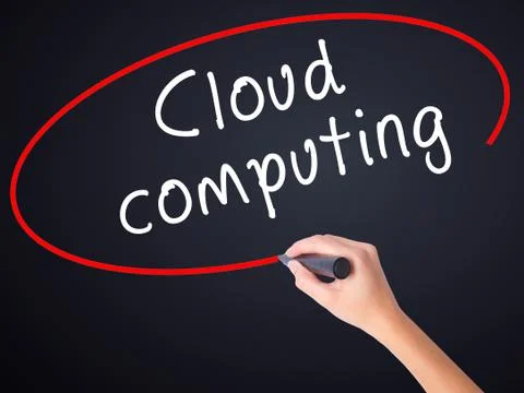 Woman Hand Writing Cloud computing with a marker over transparent board Foto stock