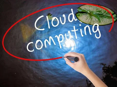 Woman Hand Writing Cloud computing with marker over transparent board Foto stock