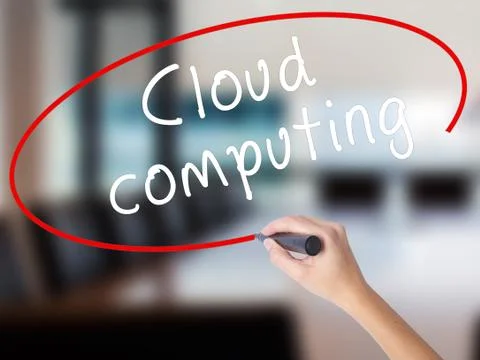 Woman Hand Writing Cloud computing with a marker over transparent board Foto stock