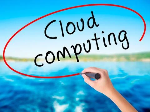 Woman Hand Writing Cloud computing with a marker over transparent board Foto stock