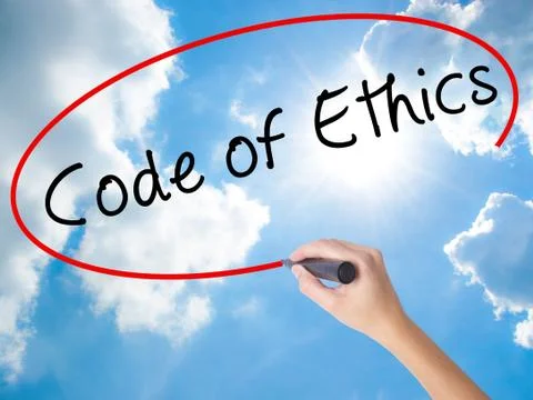 Woman Hand Writing Code of Ethics with black marker on visual screen Stock Photos