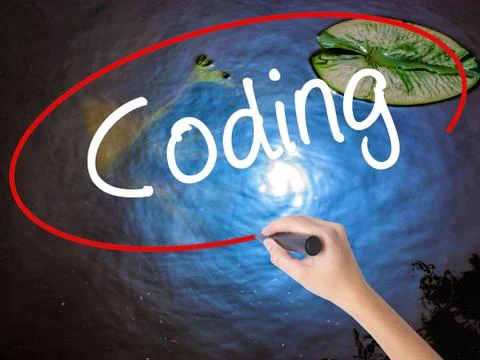 Woman Hand Writing Coding with marker over transparent board Stock-Fotos