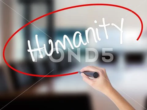 Woman Hand Writing Humanity with a marker over transparent boar Stock Photos