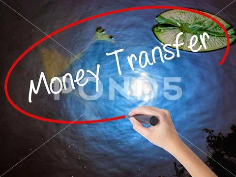 Woman Hand Writing Money Transfer with marker over transparent Stock Photos