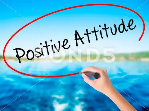 Woman Hand Writing Positive Attitude with a marker over transpar Stock Photos