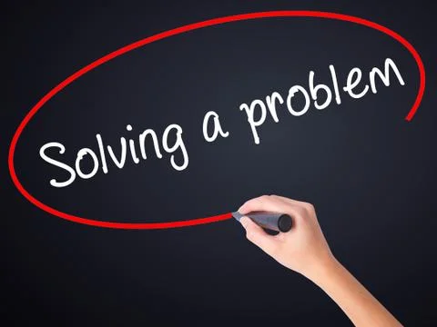 Woman Hand Writing Solving a problem with a marker over transparent board Stock Photos