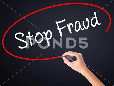 Woman Hand Writing Stop Fraud with a marker over transparent b Stock Photos