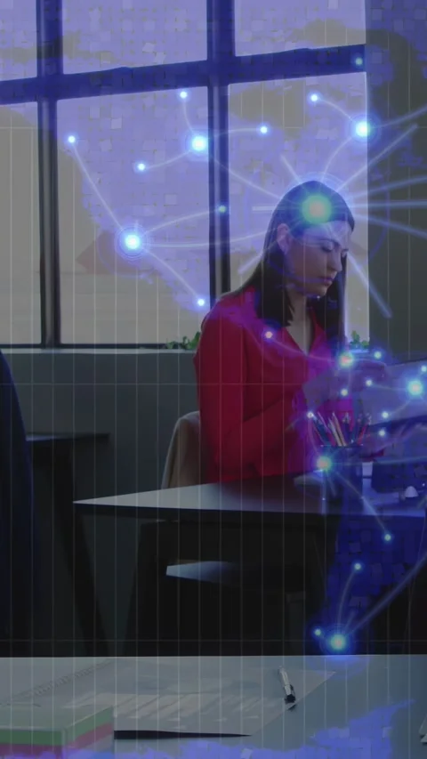 Woman handling papers while blue network fading in from right, forming node at Stock Footage 332687628