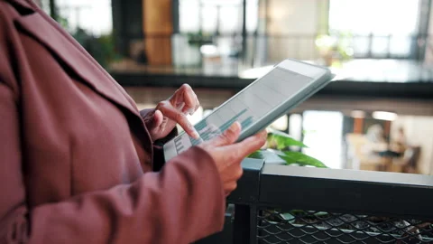 Woman, hands and data analysis in office with tablet, market research or Stock Footage 338007130