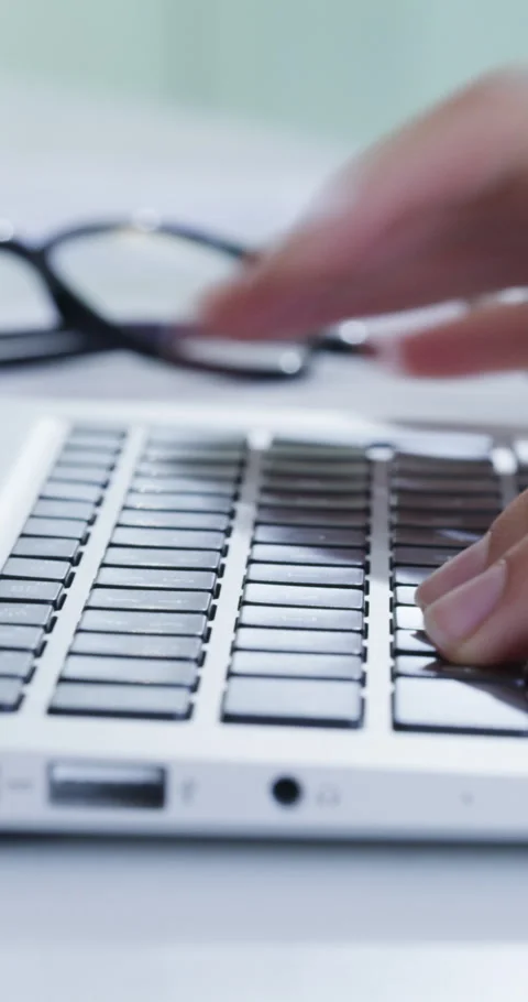 Woman, hands and typing in creative agency with laptop, research and author Stock Footage 336722331