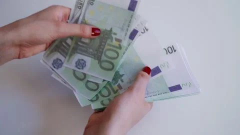 Woman hands counting stack of one hundred euro banknotes. Stock Footage 338337113